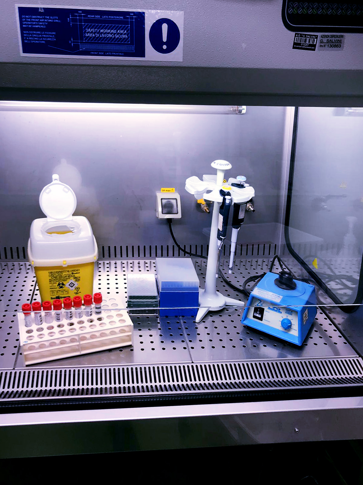photograph of test tubes for extracting and amplifying RNA from the wastewater to test for SARS CoV-2 tracing